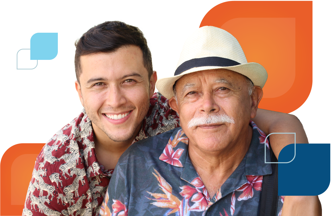 an adult mane and an older man smile facing the camera