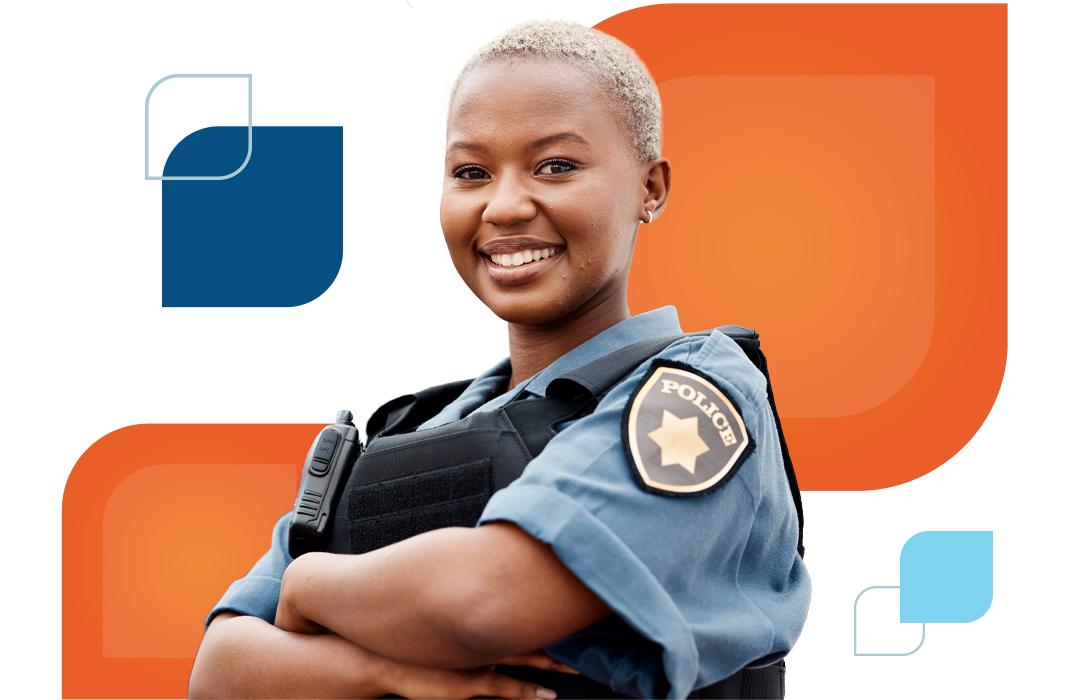 a female police officer smiles at the camera